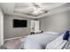 Large bedroom features a fan, and TV at 1765 Neighborhood Walk, Mcdonough, GA 30252