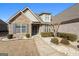Charming home featuring a stone and siding exterior, manicured landscaping, and a welcoming front entrance at 409 Brandy Ln, Mcdonough, GA 30253