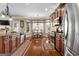 Beautiful kitchen with custom cabinets, stainless steel appliances, granite counters, and a breakfast nook with natural light at 409 Brandy Ln, Mcdonough, GA 30253