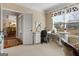 Functional home office with a view to the dining room and plenty of natural light at 409 Brandy Ln, Mcdonough, GA 30253