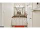 Well-maintained bathroom featuring granite countertops and white cabinetry at 1386 Sheffield Glen Ne Way, Atlanta, GA 30329