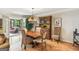 A dining area with hardwood floors, chandelier, and a stylish hutch for added character at 1386 Sheffield Glen Ne Way, Atlanta, GA 30329
