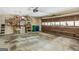 Unfinished garage with storage, a door leading outside, and a garage door at 1386 Sheffield Glen Ne Way, Atlanta, GA 30329