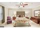Inviting main bedroom featuring neutral walls, floral bedding, and traditional furnishings at 1386 Sheffield Glen Ne Way, Atlanta, GA 30329