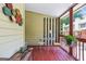 Charming screened porch with seating area, ideal for relaxing and enjoying the outdoors at 1386 Sheffield Glen Ne Way, Atlanta, GA 30329