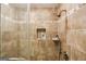 Nicely tiled shower with glass door, storage niche, and rainfall shower head at 1386 Sheffield Glen Ne Way, Atlanta, GA 30329
