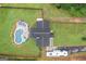 An aerial view of the house with a pool and outdoor furniture at 5745 Westwood Dr, Cumming, GA 30040