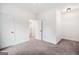 Neutral bedroom with carpet, white walls and doors, offers a serene space for rest and relaxation at 5745 Westwood Dr, Cumming, GA 30040