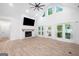 Spacious living room features vaulted ceilings, fireplace, and wood-look floors at 5745 Westwood Dr, Cumming, GA 30040
