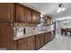 Well-equipped kitchen with granite countertops, stainless steel appliances, and ample cabinet space at 1195 New Hope Rd, Locust Grove, GA 30248