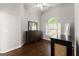 Bedroom with hardwood floors, vaulted ceilings and a large window at 4680 Brighton Lake Dr, Cumming, GA 30040