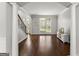 Inviting foyer with hardwood floors and staircase at 4680 Brighton Lake Dr, Cumming, GA 30040