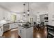 Modern kitchen with stainless steel appliances and island at 4680 Brighton Lake Dr, Cumming, GA 30040