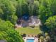 Aerial view of the community playground with a covered picnic area and sand volleyball court at 4680 Brighton Lake Dr, Cumming, GA 30040
