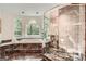 Bathroom featuring walk-in glass shower and large soaking tub at 5940 Plantation Dr, Roswell, GA 30075