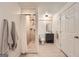 Modern bathroom showcasing a tiled shower, sleek vanity, and neutral tones, creating a spa-like experience at 5940 Plantation Dr, Roswell, GA 30075