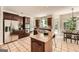 Spacious kitchen with stainless steel appliances, center island, and eat-in breakfast area at 5940 Plantation Dr, Roswell, GA 30075