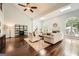 Spacious living room with hardwood floors, fireplace and skylights at 5940 Plantation Dr, Roswell, GA 30075
