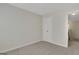 A clean, carpeted bedroom with a closet and neutral walls, offering a blank canvas for personalization at 1300 Hopkins Dr, Decatur, GA 30033
