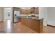Spacious kitchen with stainless steel appliances, a wooden island, and hardwood floors at 1300 Hopkins Dr, Decatur, GA 30033