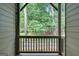 A cozy patio showcases a peaceful view of lush trees and greenery, offering a serene outdoor escape at 1300 Hopkins Dr, Decatur, GA 30033