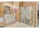 Well-lit bathroom with a glass-enclosed shower and white vanity at 835 Virginia Parks, Fayetteville, GA 30215