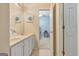 Bathroom features a double sink vanity and a doorway leading to another room at 835 Virginia Parks, Fayetteville, GA 30215