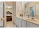 Bathroom features a double sink vanity and a doorway leading to the main bedroom at 835 Virginia Parks, Fayetteville, GA 30215