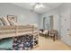 Bright bedroom with a bunk bed, ceiling fan and sitting area by the window at 835 Virginia Parks, Fayetteville, GA 30215