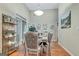 Bright dining room featuring hardwood floors, tall ceilings, and a slider to the exterior at 835 Virginia Parks, Fayetteville, GA 30215