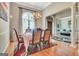 Charming dining room with hardwood floors, a chandelier, and views to the living room at 835 Virginia Parks, Fayetteville, GA 30215