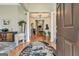 Grand foyer featuring hardwood floors, elegant columns, and stylish decor at 835 Virginia Parks, Fayetteville, GA 30215
