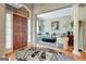 Bright foyer with hardwood floors, pillars, and an open view to the living room at 835 Virginia Parks, Fayetteville, GA 30215
