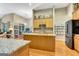 Spacious kitchen features a large island, granite countertops, and stainless steel appliances at 835 Virginia Parks, Fayetteville, GA 30215