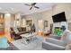 Cozy living room with a fireplace, plush seating, and view into the kitchen at 835 Virginia Parks, Fayetteville, GA 30215
