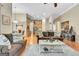 Spacious living room with an open layout, plush seating, and a view of the kitchen at 835 Virginia Parks, Fayetteville, GA 30215