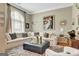 Comfortable living room featuring a plush sectional sofa and stylish decor at 835 Virginia Parks, Fayetteville, GA 30215