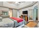 Large main bedroom featuring tray ceilings, an entertainment center and adjacent to the exterior at 835 Virginia Parks, Fayetteville, GA 30215