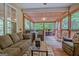 Inviting screened porch furnished with comfortable seating and outdoor views at 835 Virginia Parks, Fayetteville, GA 30215