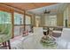 Cozy screened porch with ceiling fan and comfortable furniture at 835 Virginia Parks, Fayetteville, GA 30215