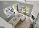 Open concept living room area with fireplace, breakfast bar, and dining area at 1535 Fenmore St, Lithia Springs, GA 30122