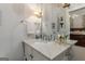 Bathroom showcasing a marble countertop vanity and decorative mirror at 381 Cherokee Se Ave, Atlanta, GA 30312