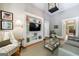 Cozy living room with built-in shelving and comfortable seating at 381 Cherokee Se Ave, Atlanta, GA 30312