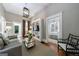 Comfortable living room with doorway to a brightly lit kitchen, and a garden at 381 Cherokee Se Ave, Atlanta, GA 30312