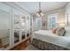 Bright main bedroom with mirrored closet and natural light at 381 Cherokee Se Ave, Atlanta, GA 30312