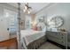 Bright main bedroom with a four-poster bed, and hardwood flooring at 381 Cherokee Se Ave, Atlanta, GA 30312