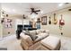 Finished basement with seating, movie screen projector and mounted guitars for entertainment at 151 Overhill Point, Alpharetta, GA 30005