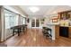 Finished basement area with bar, game area, and walkout to the exterior, great for entertaining at 151 Overhill Point, Alpharetta, GA 30005