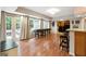 Finished basement offers ample lighting, bar area, and a game area for entertaining guests at 151 Overhill Point, Alpharetta, GA 30005