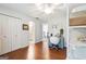 Bright bedroom with desk, hardwood floors, and closet at 151 Overhill Point, Alpharetta, GA 30005